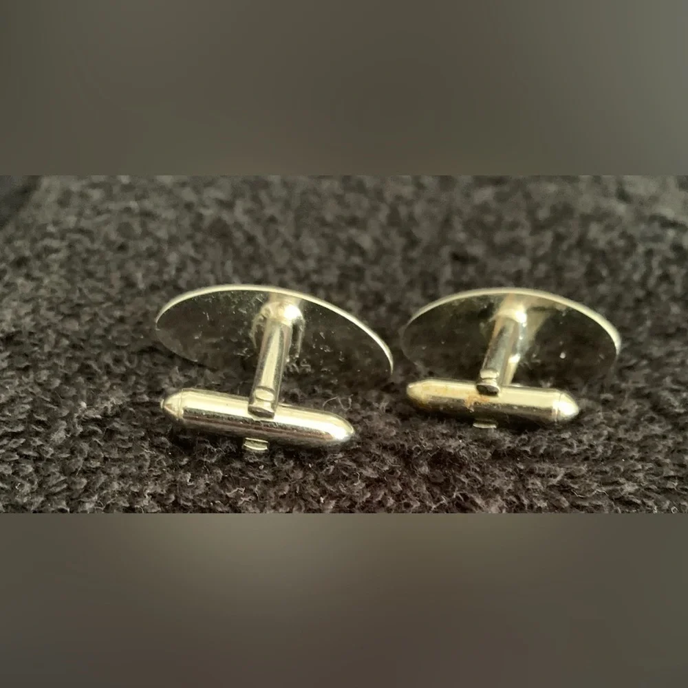 SWANK vintage oval